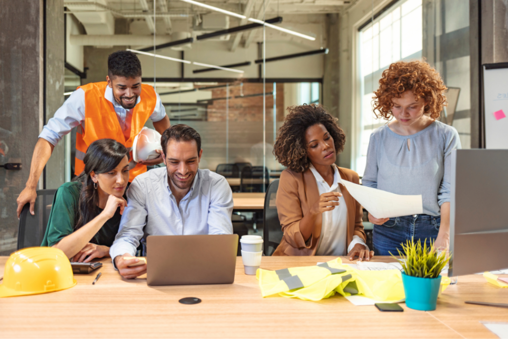 Professional NetSuite consultant in Winnipeg collaborating with business team in modern office